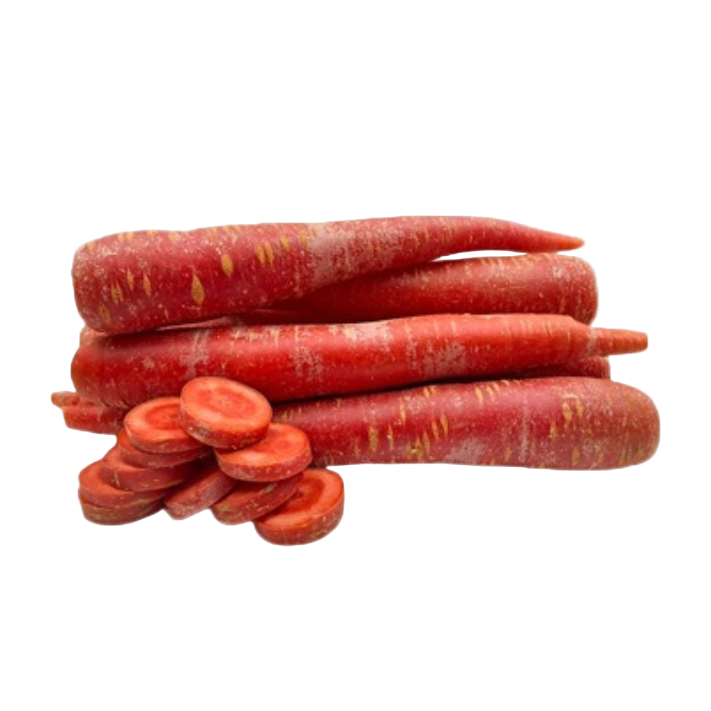 Red carrots with a few sliced on a white background